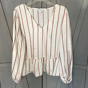 White blouse with orange vertical stripes